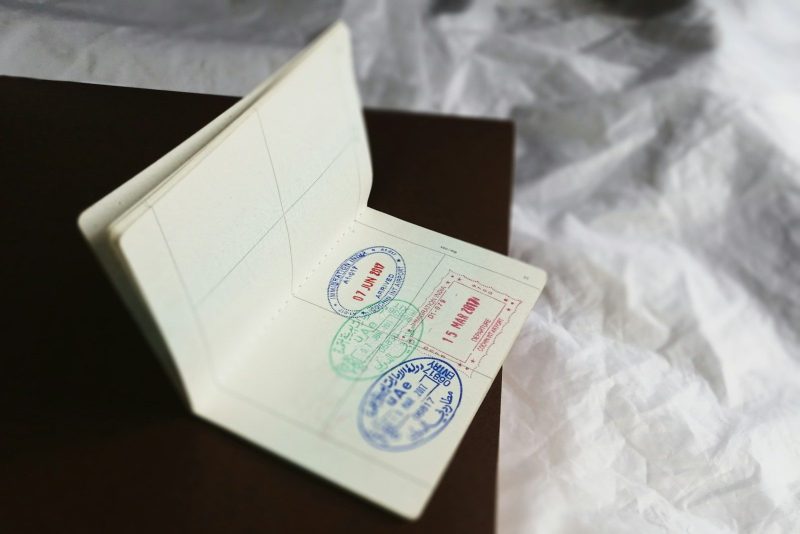long-term visa a close up of a piece of paper with stamps on it